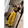 Ảnh của Set áo đen mix quần vàng