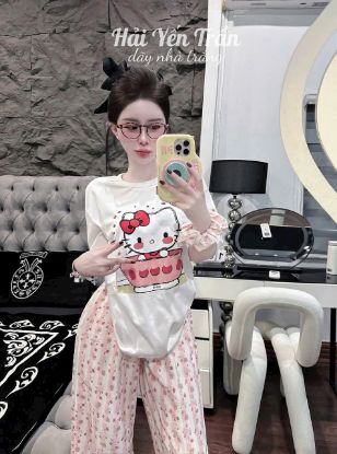 Ảnh của Set bộ mèo kitty quần đũi hoa kèm chun tóc