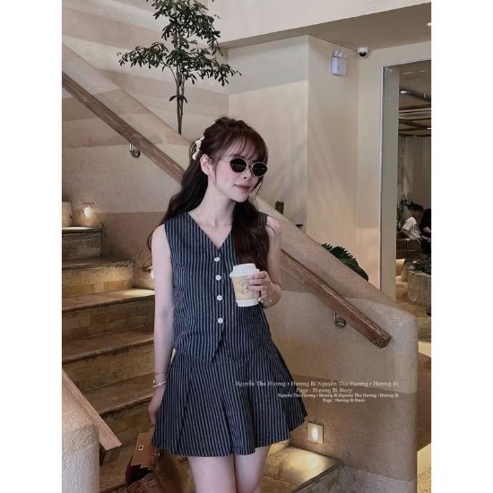Ảnh của Set áo gile kẻ mix quần váy