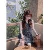 Ảnh của Set áo gile kẻ mix quần váy