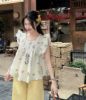 Ảnh của Set áo tay cánh tiên mix quần vàng