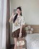 Ảnh của Set áo cô gái mix chân váy nâu